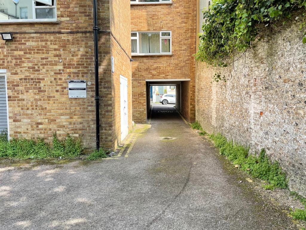 Lot: 135 - TWO PARKING SPACES IN CITY CENTRE - rear access from compound